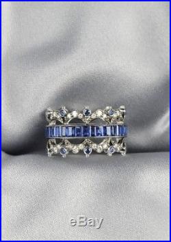 18KT White Gold, Sapphire and Diamond Band Channel Set with Emerald cut Sapphires