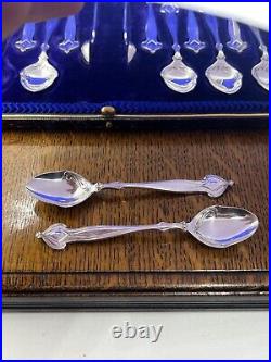 A fabulous set of silver art nouveau 12 tea spoons & tongs Sheffield 1905