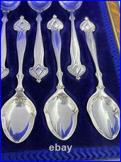 A fabulous set of silver art nouveau 12 tea spoons & tongs Sheffield 1905