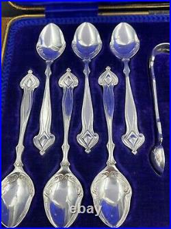 A fabulous set of silver art nouveau 12 tea spoons & tongs Sheffield 1905