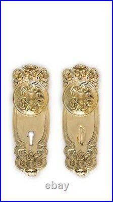 Art Nouveau doorknob set with keyed back plates for mortise locks, unl brass
