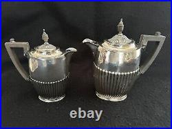 Silverplate tea set teapot coffee servers tray Art Nouveau Kirby Beard ca. 1900