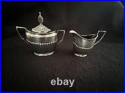 Silverplate tea set teapot coffee servers tray Art Nouveau Kirby Beard ca. 1900